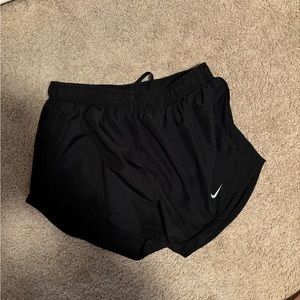 black Nike running shorts